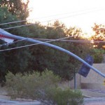 Utility poles and trees littered streets and yards in Mesa Tuesday morning after a monsoon storm. (Jim Cross/KTAR)