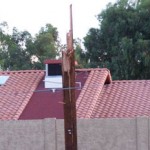 Utility poles and trees littered streets and yards in Mesa Tuesday morning after a monsoon storm. (Jim Cross/KTAR)