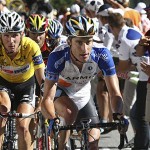 Frank Schleck of Luxemburg, left, follows Christian Vandevelde of the U.S., right, as he climbs towards l'Alpe-d'Huez during the 17th stage of the Tour de France cycling race between Embrun and l'Alpe-d'Huez, French Alps, Wednesday.