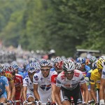 The pack rides during the 19th stage of the Tour de France cycling race between Roanne and Montlucon, central France, Friday.