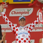 Bernhard Kohl of Austria, wearing the best climber's dotted jersey, reacts on the podium after the 19th stage of the Tour de France cycling race between Roanne and Montlucon, central France, Friday.