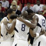 Players on the U.S. men's basketball team huddle with coach Mike Krzyzewksi during a timeout in an exhibition basketball game against Canada in Las Vegas, Friday, July 25, 2008. The U.S. team won 120-65. (AP Photo/Louie Traub)