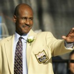 Art Monk acknowledges fans as he is introduced at the Pro Football Hall of Fame Saturday, Aug. 2, 2008, in Canton, Ohio. (AP Photo/Mark Duncan)