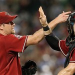 Arizona Diamondbacks' Brandon Webb, left, celebrates with teammate Chris Snyder after Webb pitched a complete game victory over the Pittsburgh Pirates in a baseball game Tuesday, Aug. 5, 2008, in Phoenix. The Diamondbacks defeated the Pirates 3-1. (AP Photo/Ross D. Franklin)