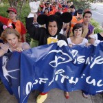 Protesters dressed as Disney characters lead a march from the Paradise Pier Hotel to the main entrance of Disneyland during a demonstration protesting Disney's treatment of hotel workers in Anaheim, Calif., on Thursday, Aug. 14, 2008. (AP Photo/Carlos Delgado)