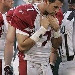 Arizona Cardinals quarterback Matt Leinart (7) walks on the sidelines after he was taken out of the game against the Oakland Raiders in the second quarter of their preseason football game in Oakland, Calif., Saturday, Aug. 23, 2008. (AP Photo/Paul Sakuma)