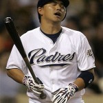 San Diego Padres' Tadahito Iguchi reacts to being called out on strikes to end the sixth inning against the Arizona Diamondbacks in a baseball game Monday, Aug. 25, 2008 in San Diego. (AP Photo/Lenny Ignelzi)