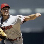Arizona Diamondbacks starter Randy Johnson pitches against the San Diego Padres in the first inning of a baseball game Wednesday, Aug. 27, 2008, in San Diego. (AP Photo/Lenny Ignelzi)