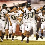 Cal Poly San Luis Obispo's Tony Smith (7) and Scottie Cordier (10) celebrate after Cal Poly beat San Diego State 29-27 on a fourth quarter field goal during a college football game Saturday, Aug. 30, 2008, in San Diego. (AP Photo/Denis Poroy)