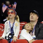 Delegate David Springer, of San Jose, Calif., and his daughters Emily, 8, left, and Zoe, 6, look over the floor of the Xcel Center before the start of the Republican National Convention in St. Paul, Minn., Thursday, Sept. 4, 2008. (AP Photo/Susan Walsh)
