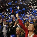 Delegates look up as the balloons fall after Republican presidential nominee John McCain concluded his speech at the Republican National Convention in St. Paul, Minn., Thursday, Sept. 4, 2008. (AP Photo/Jae C. Hong)