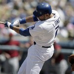 Los Angeles Dodgers' James Loney hits a broken-bat two-run single against the Arizona Diamondbacks in the first inning of a baseball game Sunday, Sept. 7, 2008, in Los Angeles. (AP Photo/Ric Francis)