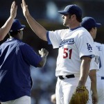 Los Angeles Dodgers pitcher Jonathan Broxton (51) celebrates with teammates after a baseball game against the Arizona Diamondbacks Sunday, Sept. 7, 2008, in Los Angeles. The Dodger won 5-2. (AP Photo/Ric Francis)