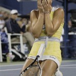 Jelena Jankovic, of Serbia, reacts after losing a point to Serena Williams, of the United States, during the women's finals championship match at the U.S. Open tennis tournament in New York, Sunday, Sept. 7, 2008. (AP Photo/Julie Jacobson)
