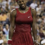 Serena Williams, of the United States, grimaces after losing a point to Jelena Jankovic, of Serbia, during the women's finals championship match at the U.S. Open tennis tournament in New York, Sunday, Sept. 7, 2008. (AP Photo/Julie Jacobson)