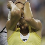Jelena Jankovic, of Serbia, reacts after losing a point to Serena Williams, of the United States, during the women's finals championship match at the U.S. Open tennis tournament in New York, Sunday, Sept. 7, 2008. (AP Photo/Julie Jacobson)