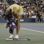 Jelena Jankovic, of Serbia, reacts after losing a point to Serena Williams, of the United States, during the women's finals championship match at the U.S. Open tennis tournament in New York, Sunday, Sept. 7, 2008. Williams defeated Jankovic in two sets to win the championship. (AP Photo/Julie Jacobson)