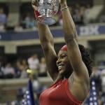 Serena Williams, of the United States, holds up her championship trophy after defeating Jelena Jankovic, of Serbia, to win the women's finals championship match at the U.S. Open tennis tournament in New York, Sunday, Sept. 7, 2008. (AP Photo/Elise Amendola)