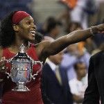 Serena Williams, of the United States, holds up her championship trophy after defeating Jelena Jankovic, of Serbia, to win the women's finals championship match at the U.S. Open tennis tournament in New York, Sunday, Sept. 7, 2008. (AP Photo/Julie Jacobson)