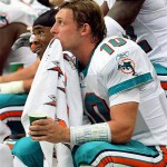 Miami Dolphins' Chad Pennington (10) sits on the bench after playing his last series against the Arizona Cardinals in the fourth quarter of an NFL football game Sunday, Sept. 14, 2008, in Glendale, Ariz. The Cardinals defeated the Dolphins 31-10. (AP Photo/Ross D. Franklin) 
