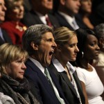 Sen. John Kerry, D-Mass., and former Democratic presidential candidate, center, yawns before the start of a presidential debate between John McCain and Barack Obama at the University of Mississippi in Oxford, Miss., Friday, Sept. 26, 2008. (AP Photo/LM Otero)
