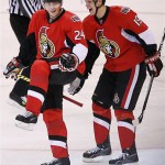 Ottawa Senators' Anton Volchenkov pumps his fist as teammate Jason Spezza congratulates him for his second-period goal against the Phoenix Coyotes during NHL hockey action at the Scotiabank Place in Ottawa, Canada, on Friday, Oct. 17, 2008. (AP Photo/The Canadian Press,Sean Kilpatrick)