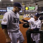 Tampa Bay Rays manager Joe Maddon, right, talks starting pitcher Scott Kazmir after pitching during Game 1 of the baseball World Series in St. Petersburg, Fla., Wednesday, Oct. 22, 2008. (AP Photo/Chris O'Meara)