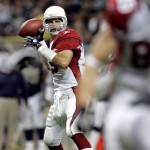 Arizona Cardinals quarterback Kurt Warner looks for a reciever during the third quarter of an NFL football game against the St. Louis Rams, Sunday, Nov. 2, 2008, in St. Louis. Warner had his 45th 300-yard passing game, throwing for two touchdowns to defeat the St. Louis Rams 34-13. (AP Photo/Jeff Roberson)