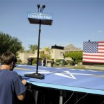 A worker sets up the platform during the set up process for John McCain's election night gathering in the garden area of the Biltmore in Phoenix, Tuesday, Nov. 4, 2008. (AP Photo/Chris Carlson)