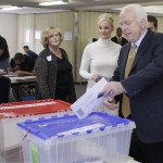 Republican presidential candidate Sen. John McCain, R-Ariz., accompanied by his wife Cindy, votes in the 2008 presidential election at the Albright United Methodist Church in Phoenix, Ariz., Tuesday, Nov. 4, 2008. (AP Photo/Stephan Savoia)