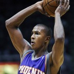 Phoenix Suns' Raja Bell looks to pass the ball during the third quarter of an NBA basketball game against the New Jersey Nets Tuesday, Nov. 4, 2008 in East Rutherford, N.J. The Suns beat the Nets 114-86. (AP Photo/Bill Kostroun)