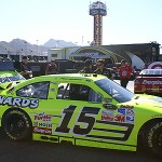 Paul Menard's No. 15 car gets looked at after a run on the track. (Adam Green/Sports620 KTAR)