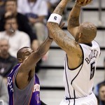 Phoenix Suns center Amare Stoudemire (1) moves in to block Utah Jazz forward Carlos Boozer (5) during the first quarter of the NBA basketball game Monday, Nov. 17, 2008, in Salt Lake City. (AP Photo/Douglas C. Pizac)