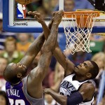 Utah Jazz forward Paul Millsap (24) rejects Phoenix Suns center Shaquille O'Neal (32) during the fourth quarter of the NBA basketball game Monday, Nov. 17, 2008, in Salt Lake City. The Jazz defeated the Suns 109-97. (AP Photo/Douglas C. Pizac)