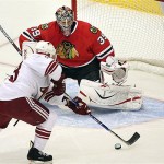 Chicago Blackhawks' Nikolai Khabibulin (39), of Russia, moves into position to make a save on a shot by Phoenix Coyotes' Kevin Porter in the first period of an NHL hockey game Tuesday, Nov. 18, 2008 in Glendale, Ariz. (AP Photo/Ross D. Franklin)