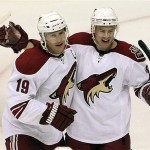 Phoenix Coyotes' Shane Doan (19), celebrates his goal in his 900th career game, with teammate Steven Reinprecht in the third period of an NHL hockey game against the Chicago Blackhawks Tuesday, Nov. 18, 2008 in Glendale, Ariz. The Blackhawks defeated the Coyotes 3-2 in a shootout. (AP Photo/Ross D. Franklin)
