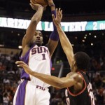 Phoenix Suns forward Amare Stoudemire shoots over Portland Trail Blazers forward LaMarcus Aldridge, right, in the third quarter of an NBA basketball game Saturday, Nov. 22, 2008, in Phoenix. (AP Photo/Paul Connors)