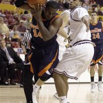 Pepperdine guard Rico Tucker, left, struggles to maintain control of the ball as he attempts to drive around Arizona State forward Jeff Pendergraph during the first half of an NCAA college basketball game Sunday, Nov. 23, 2008, in Tempe, Ariz. (AP Photo/Paul Connors)