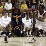 Pepperdine guard Keion Bell, left, drives to the basket around Arizona State guard Ty Abbott during the first half of an NCAA college basketball game Sunday, Nov. 23, 2008, in Tempe, Ariz. (AP Photo/Paul Connors)