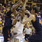 Arizona State forward Jeff Pendergraph, center, is double-teamed by Pepperdine forward Taylor Darby, left, and center Corbin Moore, right, in the second half of an NCAA college basketball game Sunday, Nov. 23, 2008, in Tempe, Ariz. Arizona State won 61-40. (AP Photo/Paul Connors)