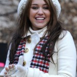 Miley Cyrus waits aboard the "Bolt" float before the start of the 82nd annual Macy's Thanksgiving Day parade, Thursday, Nov. 27, 2008, in New York. (AP Photo/Louis Lanzano)
