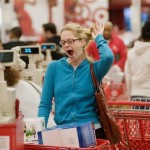 Erin Westerman of West Hollywood, Calif. yawns while waiting in line with a friend after shopping for discounted home appliances at Target in West Hollywood, Calif., Friday, Nov. 28, 2008. (AP Photo/David Zentz)