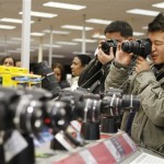 Shoppers look at cameras at a Circuit City store on Black Friday, the first shopping day after Thanksgiving, Friday, Nov. 28, 2008, in Baileys Crossroads, Va. (AP Photo/Gerald Herbert)