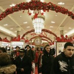People shop at Macy's department store which opened at 5:00 a.m. Friday, Nov. 28, 2008, in New York. The nation's retailers are set to usher in the holiday shopping season Friday with pre-dawn openings and deep discounts. (AP Photo/Frank Franklin II)