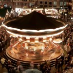 A merry go round is seen at the traditional Christmas market which opened in Frankfurt, central Germany, on Wednesday, Nov. 26, 2008 (AP Photo/Michael Probst)
