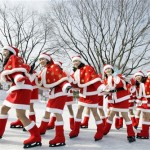 Amusement park employees dressed as Santa Claus skate on the ice during a class of Santa Academy as part of promotional event for the Christmas at the Everland amusement park in Yongin, South Korea, Wednesday, Nov. 26, 2008. Christmas is one of the biggest holidays celebrated in South Korea with over half the population being Christians. (AP Photo/Lee Jin-man)

