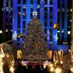The Rockefeller Center Christmas tree is lit in New York, Wednesday, Dec. 3, 2008. (AP Photo/Diane Bondareff)
