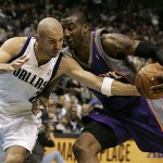 Dallas Mavericks guard Jason Kidd, left, steals the ball away from Phoenix Suns forward Amare Stoudemire, right, in the second half of an NBA basketball game in Dallas, Thursday, Dec. 4, 2008. (AP Photo/Tony Gutierrez)
