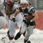 New England Patriots' Wes Welker is chased by Arizona Cardinals' Gabe Watson (98) during the second quarter of an NFL football game Sunday, Dec. 21, 2008, in Foxborough, Mass. (AP Photo/Winslow Townson)