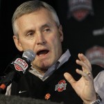 Ohio State coach Jim Tressel answers reporters' questions during a news conference after arriving Monday, Dec. 29, 2008, at Sky Harbor International Airport in Phoenix. Ohio State will play Texas in the Fiesta Bowl on Jan. 5. (AP Photo/Paul Connors)
